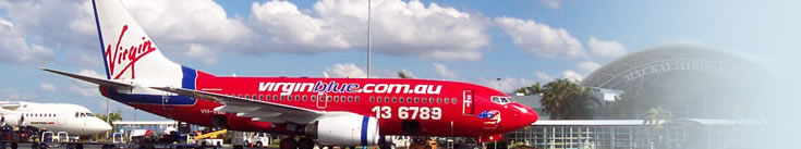 Planes parked on runway at Mackay Airport